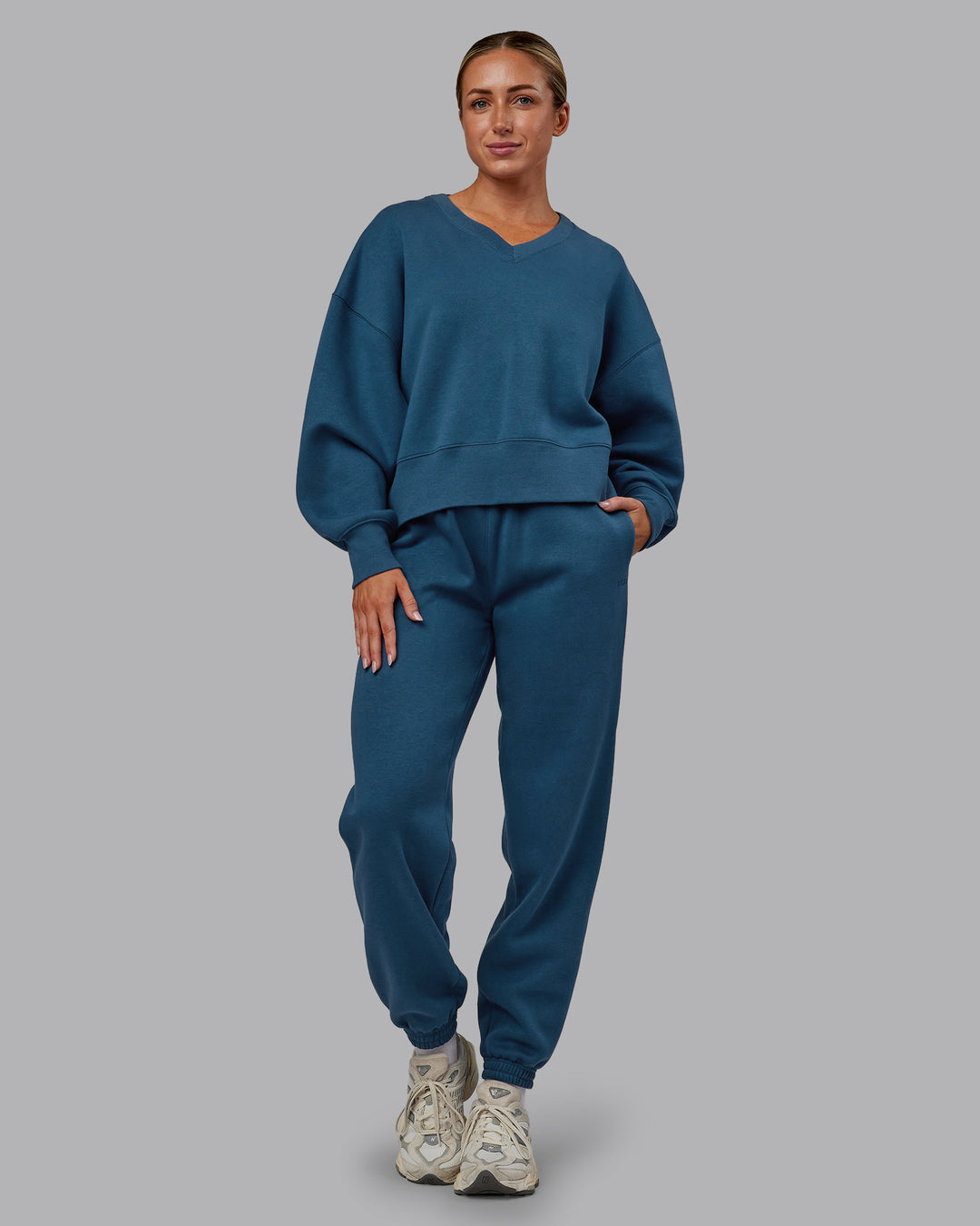 Woman wearing MVP V Neck Oversized Sweater - Indigo | Model:Paris | Size:S - view 3