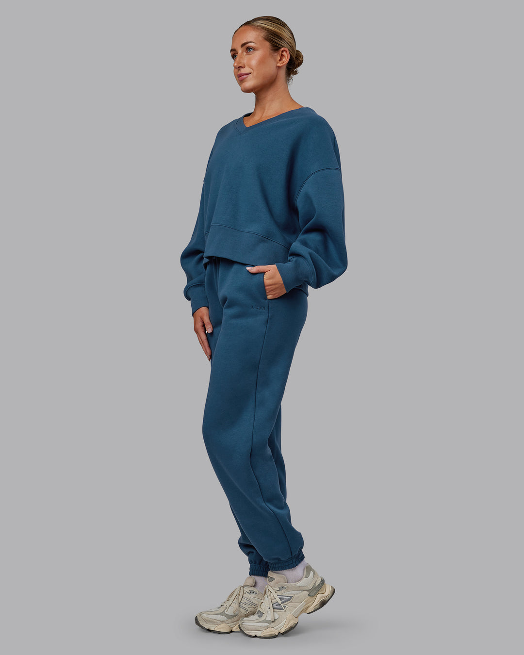 Woman wearing MVP V Neck Oversized Sweater - Indigo | Model:Paris | Size:S - view 2