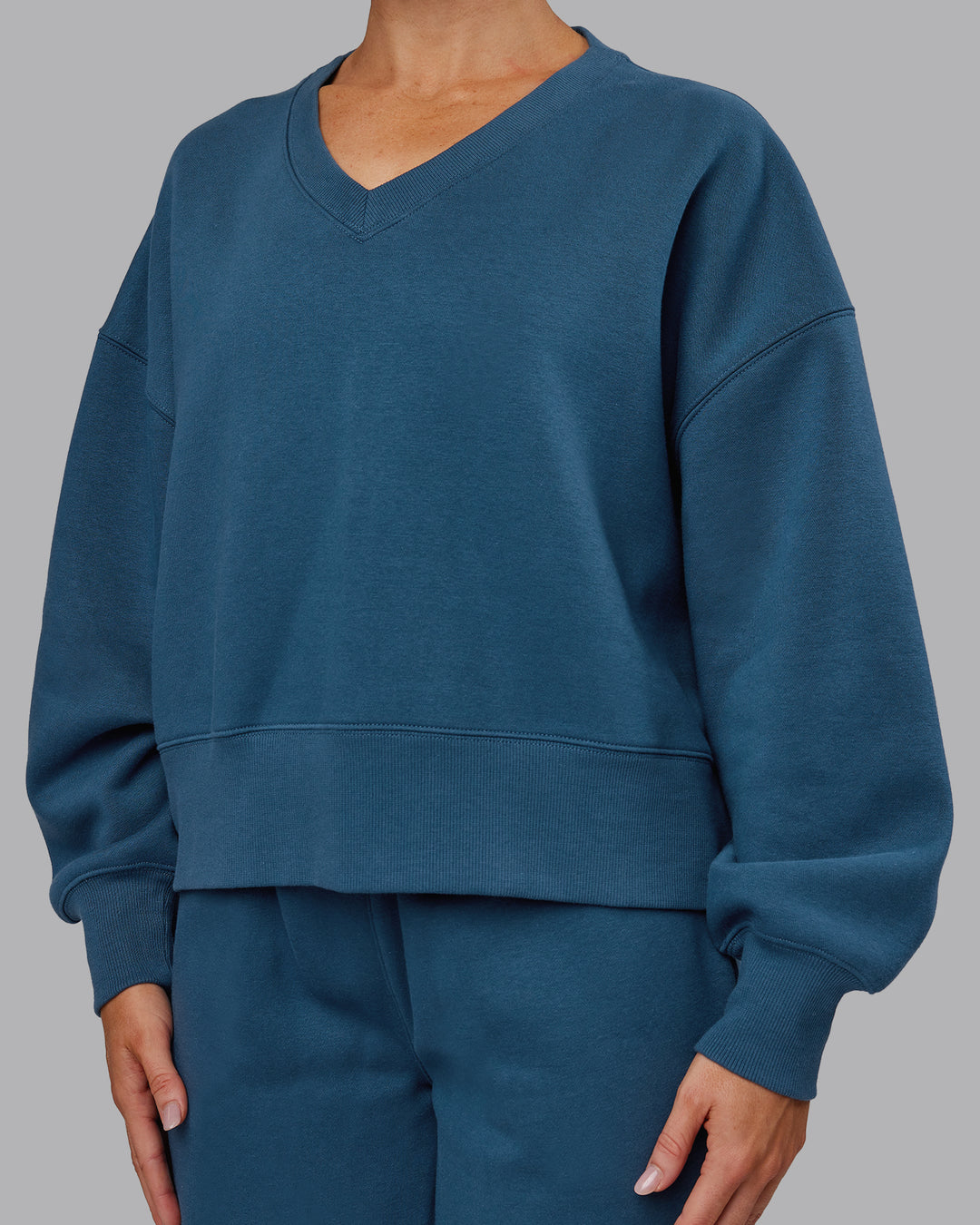Woman wearing MVP V Neck Oversized Sweater - Indigo | Model:Paris | Size:S - view 5