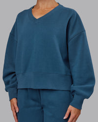 Woman wearing MVP V Neck Oversized Sweater - Indigo | Model:Paris | Size:S | Thumbnail Index: 4