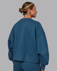 Woman wearing MVP V Neck Oversized Sweater - Indigo | Model:Paris | Size:S | Thumbnail Index: 3
