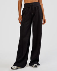 Woman wearing MVP Wide Leg Tall Track Pant - Black | Model:Ruby | Size:S | Thumbnail Index: 0
