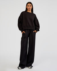 Woman wearing MVP Wide Leg Tall Track Pant - Black | Model:Ruby | Size:S | Thumbnail Index: 5