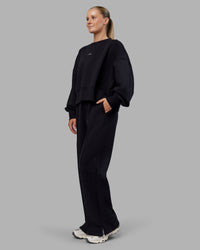 Woman wearing MVP Wide Leg Track Pant - Black | Model:Neve | Size:S | Thumbnail Index: 1