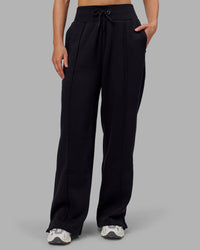 Woman wearing MVP Wide Leg Track Pant - Black | Model:Neve | Size:S | Thumbnail Index: 0