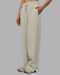 Woman wearing MVP Wide Leg Track Pant - Shale Beige | Model:Emilie | Size:S | Thumbnail Index: 0