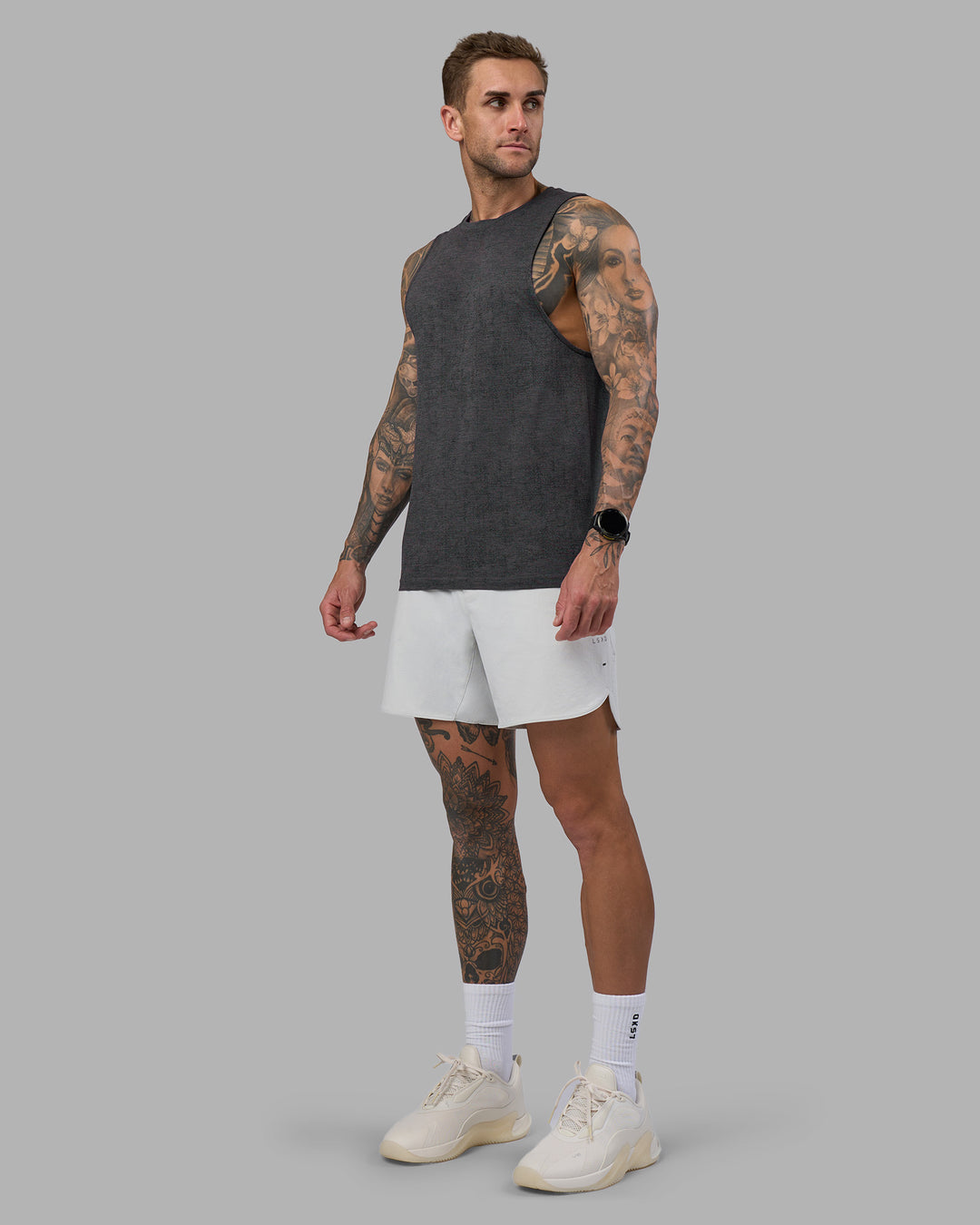 Man wearing AeroFLX+ Seamless Muscle Tank - Black Camo-Graphite | Model:Tommy | Size:S - view 2
