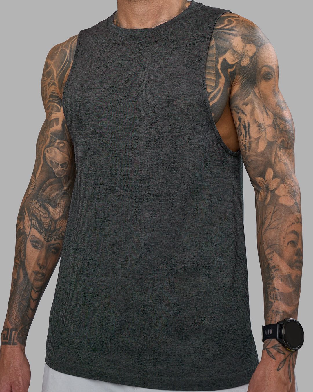 Man wearing AeroFLX+ Seamless Muscle Tank - Black Camo-Graphite | Model:Tommy | Size:S - view 4