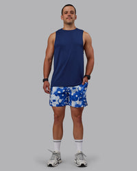 Man wearing AeroFLX+ Seamless Muscle Tank - Midnight Blue/Midnight Blue Marl | Thumbnail Index: 1