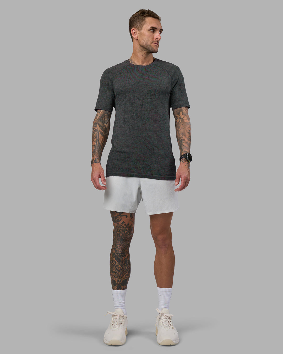 Man wearing AeroFLX+ Seamless Tee - Black Camo-Graphite | Model:Tommy | Size:L - view 5