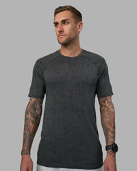 Man wearing AeroFLX+ Seamless Tee - Black Camo-Graphite | Model:Tommy | Size:L | Thumbnail Index: 0