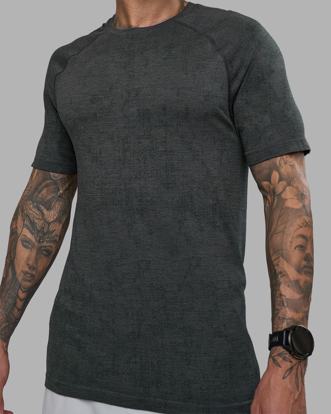 Man wearing AeroFLX+ Seamless Tee - Black Camo-Graphite | Model:Tommy | Size:L - view 6