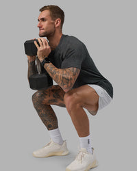 Man wearing AeroFLX+ Seamless Tee - Black Camo-Graphite | Model:Tommy | Size:L | Thumbnail Index: 2