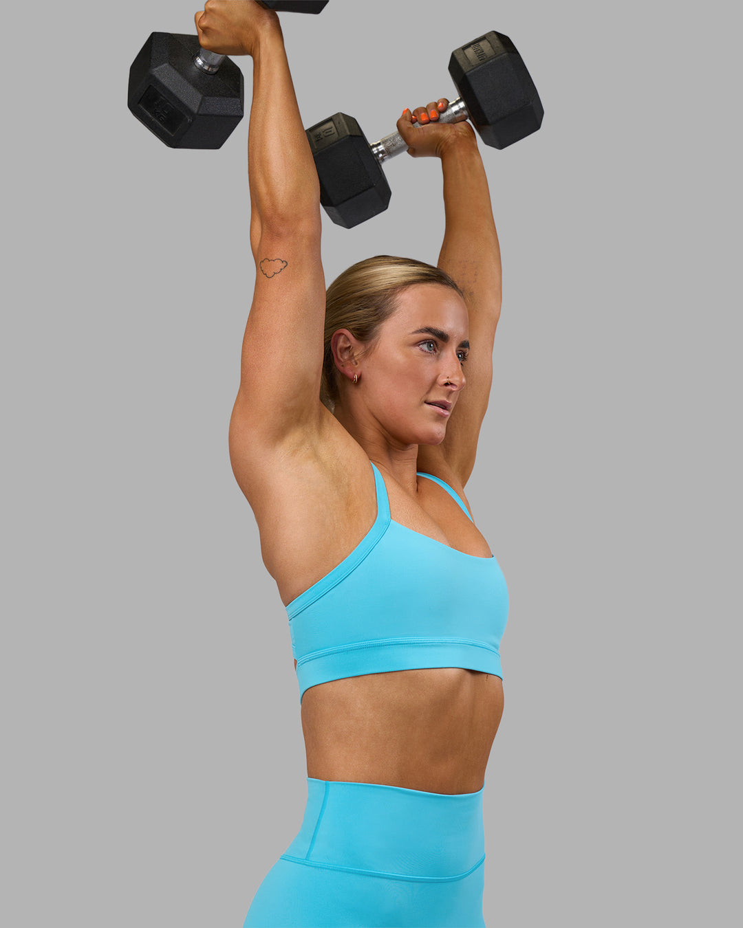 Woman wearing Momentum Sports Bra - Blue Atoll | Model:Georgia | Size:S - view 3
