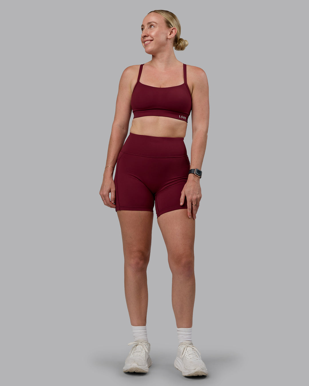 Woman wearing Momentum Sports Bra (D/DD/E) - Cordovan - view 5