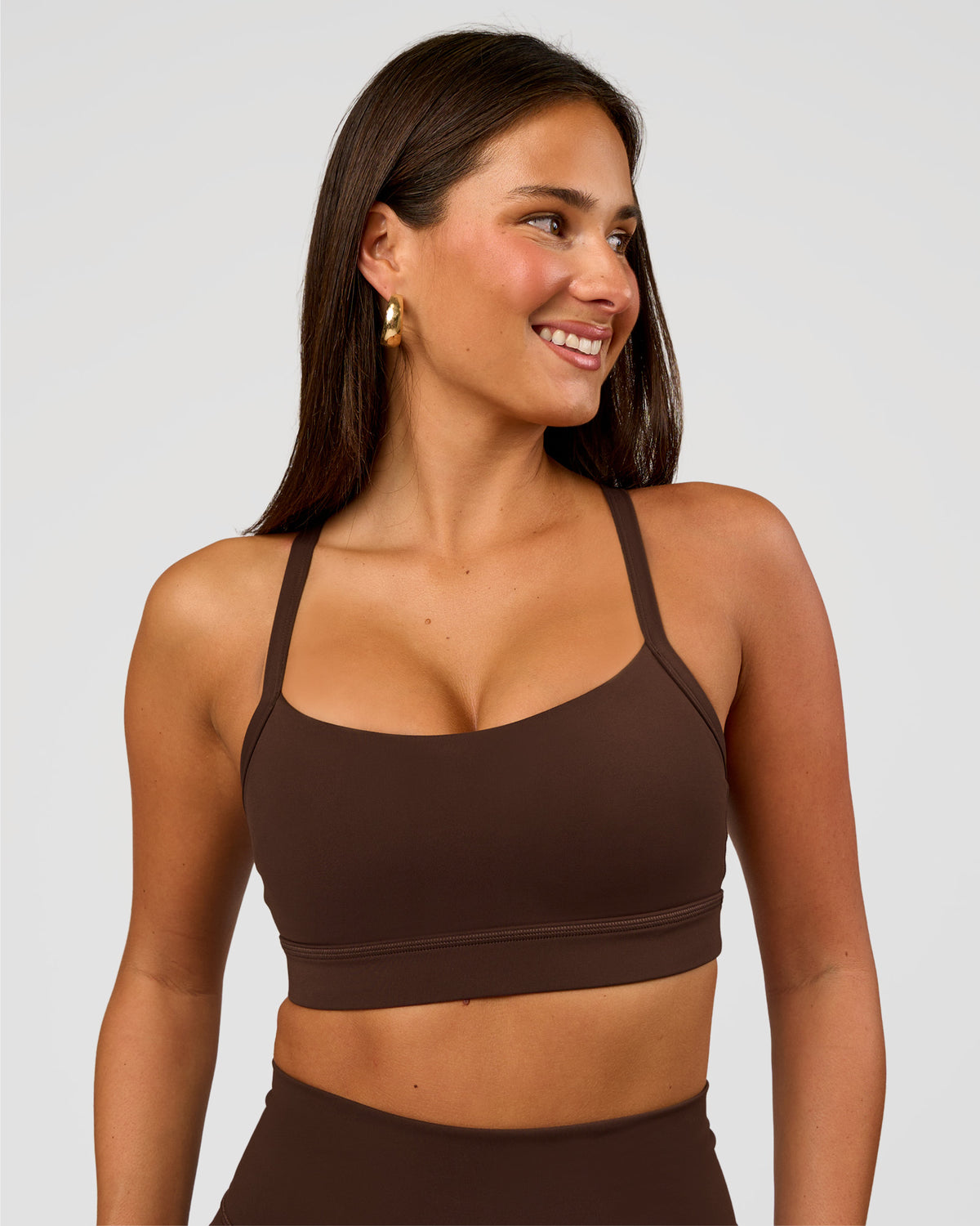 Woman wearing Momentum Sports Bra D/DD/E - Hot Chocolate | Model:Bianca | Size:S