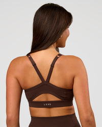 Woman wearing Momentum Sports Bra D/DD/E - Hot Chocolate | Model:Bianca | Size:S | Thumbnail Index: 1