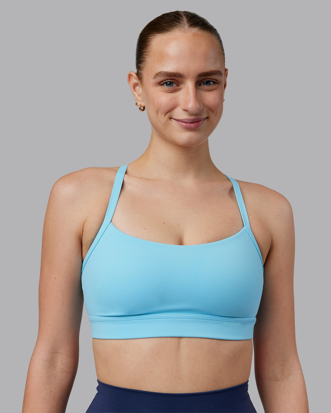 Woman wearing Momentum Sports Bra D/DD/E - Sky Blue | Model:Lillie | Size:S - view 1