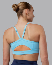 Woman wearing Momentum Sports Bra D/DD/E - Sky Blue | Model:Lillie | Size:S | Thumbnail Index: 1