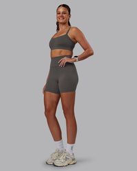 Woman wearing Momentum Sports Bra - Dark Storm | Model:Phoebe | Size:S | Thumbnail Index: 2