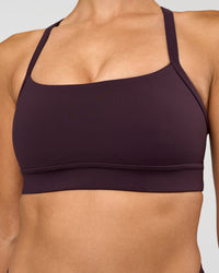 Woman wearing Momentum Sports Bra - Midnight Plum | Model:Rhiley | Size:S | Thumbnail Index: 3