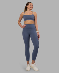 Woman wearing Momentum Sports Bra - Night Shadow | Model:Phoebe | Size:S | Thumbnail Index: 5