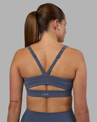 Woman wearing Momentum Sports Bra - Night Shadow | Model:Phoebe | Size:S | Thumbnail Index: 4