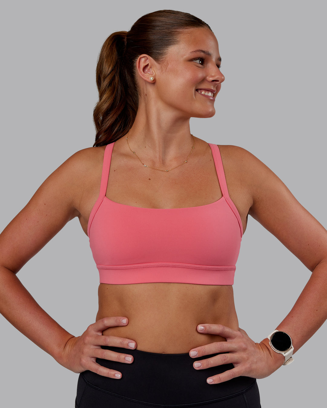 Woman wearing Momentum Sports Bra - Pink Lemonade | Model:Phoebe | Size:S - view 1