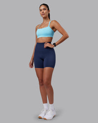 Woman wearing Momentum Sports Bra - Sky Blue | Model:Rhiley | Size:S | Thumbnail Index: 2