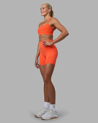 Woman wearing Momentum Sports Bra - Ultra Orange | Model:Katie | Size:S | Thumbnail Index: 3