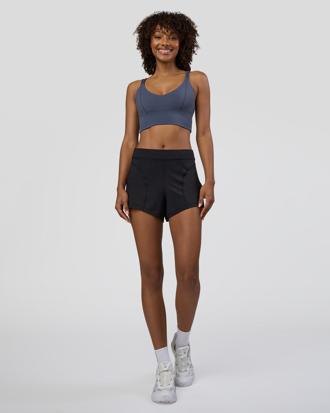 Woman wearing Movement CloudFLX 3" Short - Black | Model:Tomi | Size:S - view 2