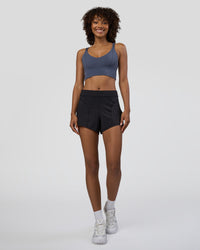 Woman wearing Movement CloudFLX 3" Short - Black | Model:Tomi | Size:S | Thumbnail Index: 1