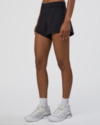 Woman wearing Movement CloudFLX 3" Short - Black | Model:Tomi | Size:S | Thumbnail Index: 6