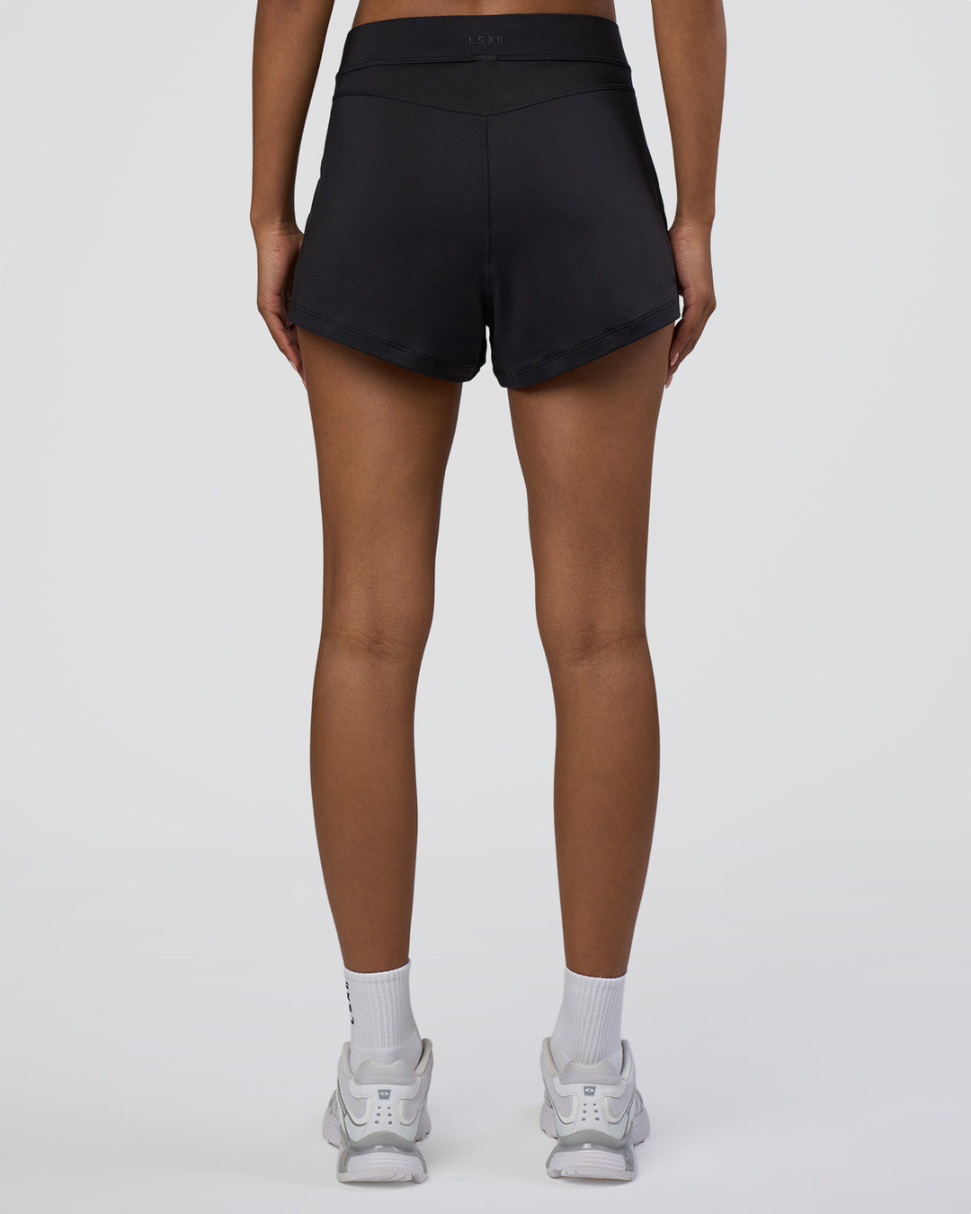 Woman wearing Movement CloudFLX 3" Short - Black | Model:Tomi | Size:S - view 3