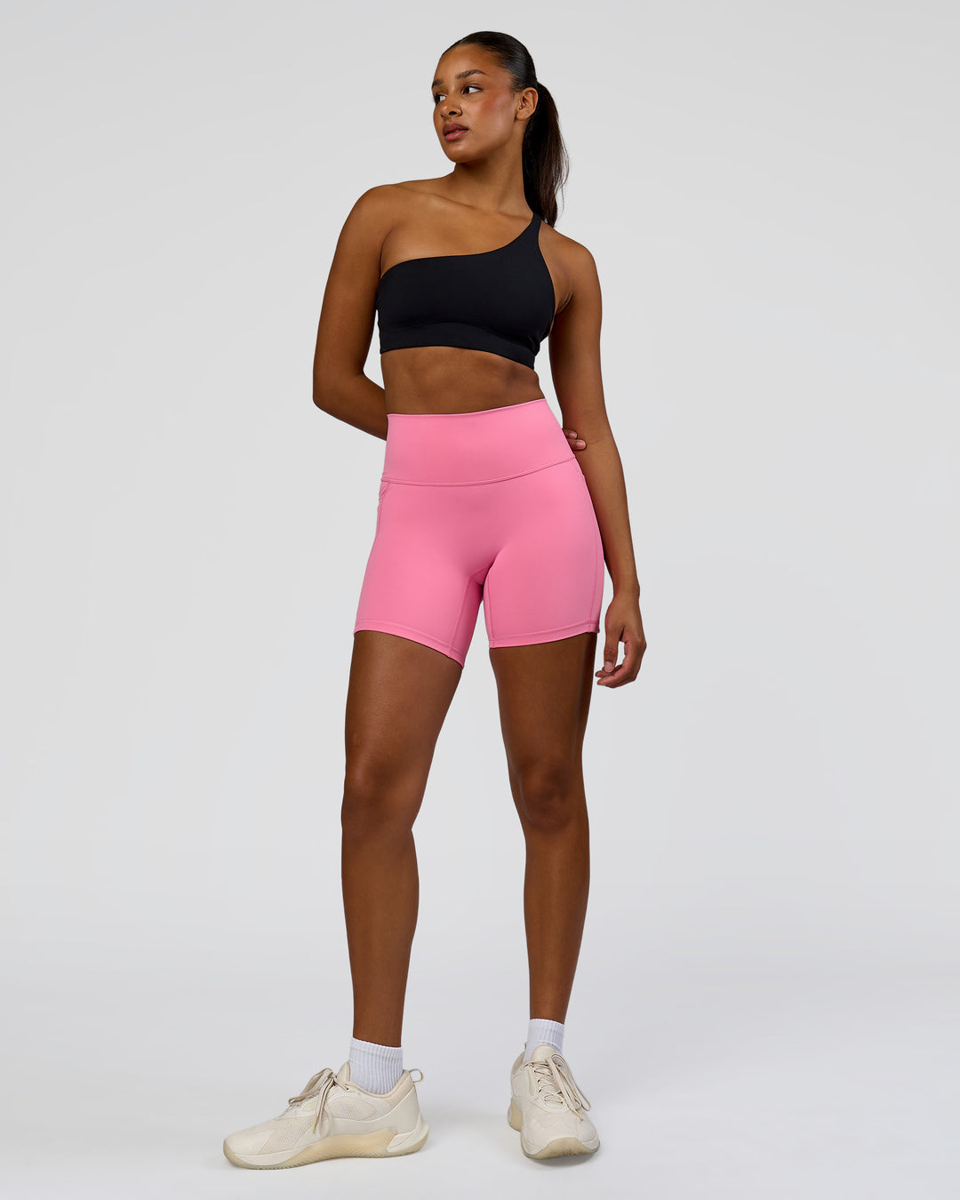 Woman wearing Muse Asymmetric Sports bra - Black | Model:Rosie | Size:S - view 4