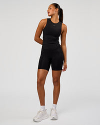 Woman wearing NyxRun Stash Tank - Black | Model:Rosie | Size:S | Thumbnail Index: 4
