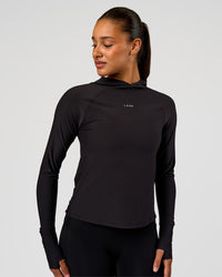 Woman wearing On the Run Long Sleeve - Black | Model:Rosie | Size:S | Thumbnail Index: 0