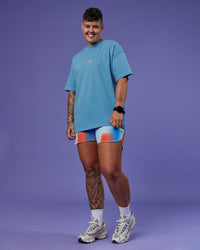 Model wearing Our Journey Heavyweight Oversized Tee - Azure Blue-Rainbow | Model:Em | Size:S | Thumbnail Index: 6