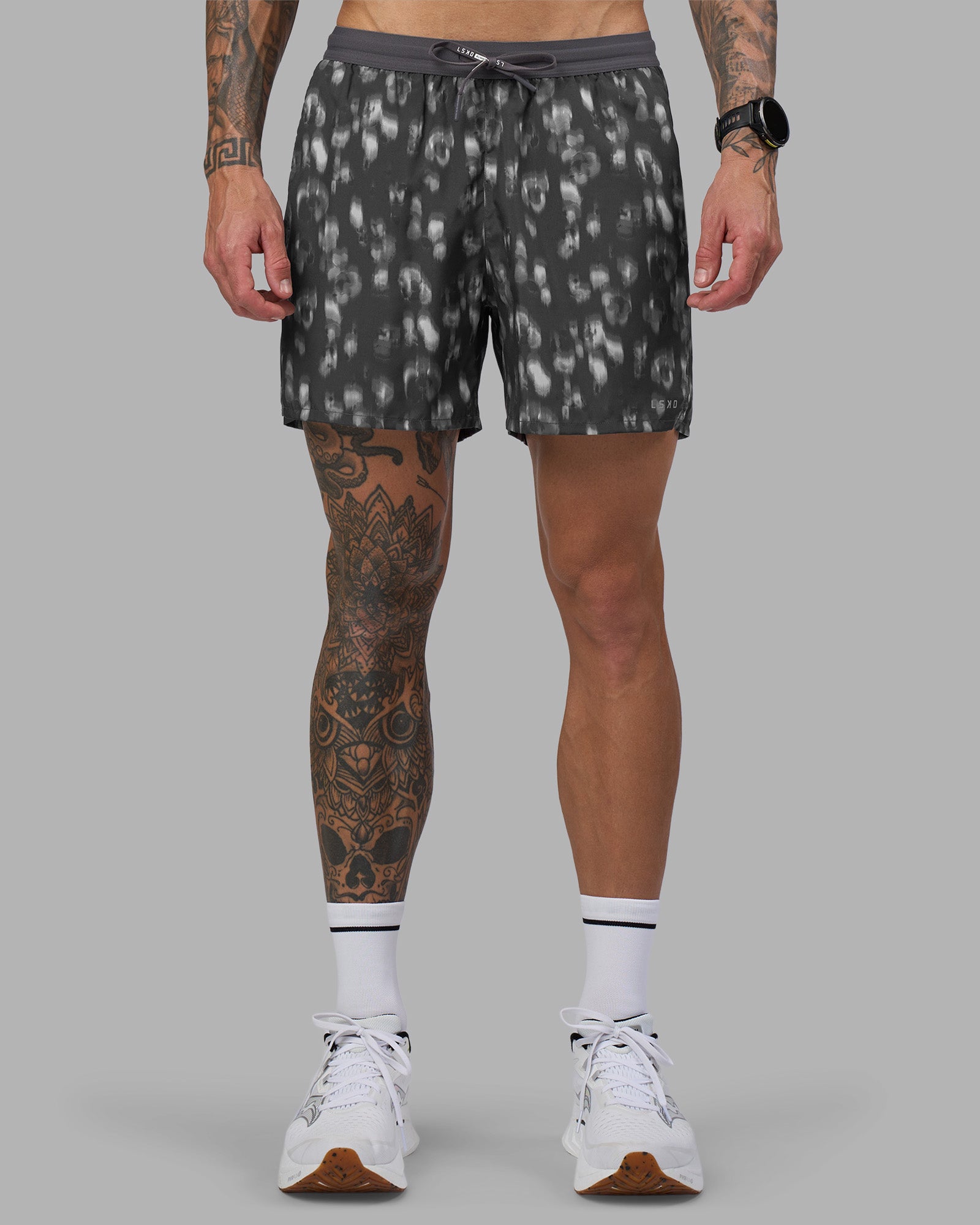 Man wearing Pace 5" Lined Running Short - Markings Dark Storm Print | Model:Tommy | Size:S
