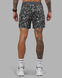 Man wearing Pace 5" Lined Running Short - Markings Dark Storm Print | Model:Tommy | Size:S | Thumbnail Index: 7