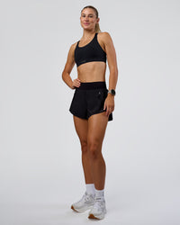 Woman wearing Pacer 3" Run Short - Black | Model:Emelia | Size:S | Thumbnail Index: 6