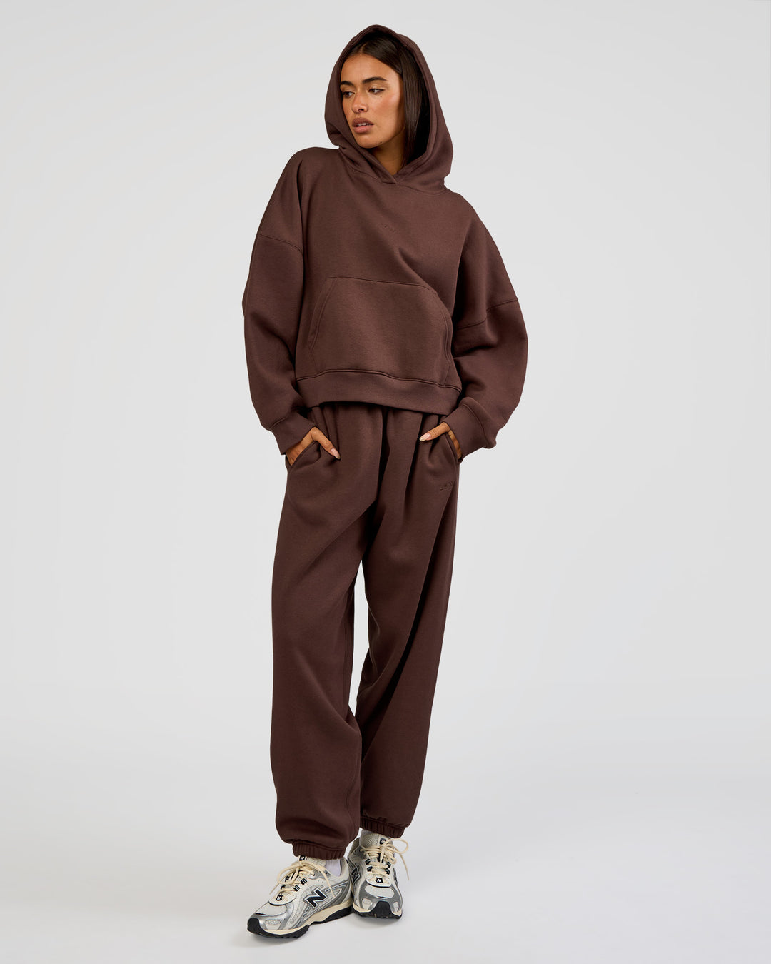 Woman wearing Post Train Hoodie - Hot Chocolate | Model:Ruby | Size:S - view 2