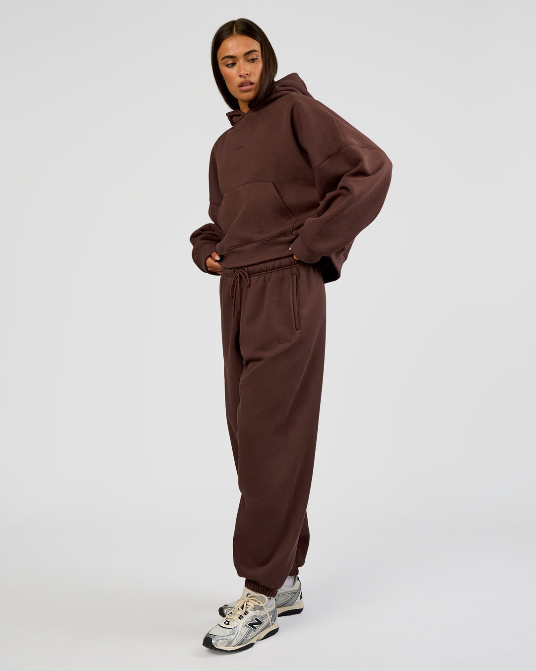 Woman wearing Post Train Hoodie - Hot Chocolate | Model:Ruby | Size:S - view 4