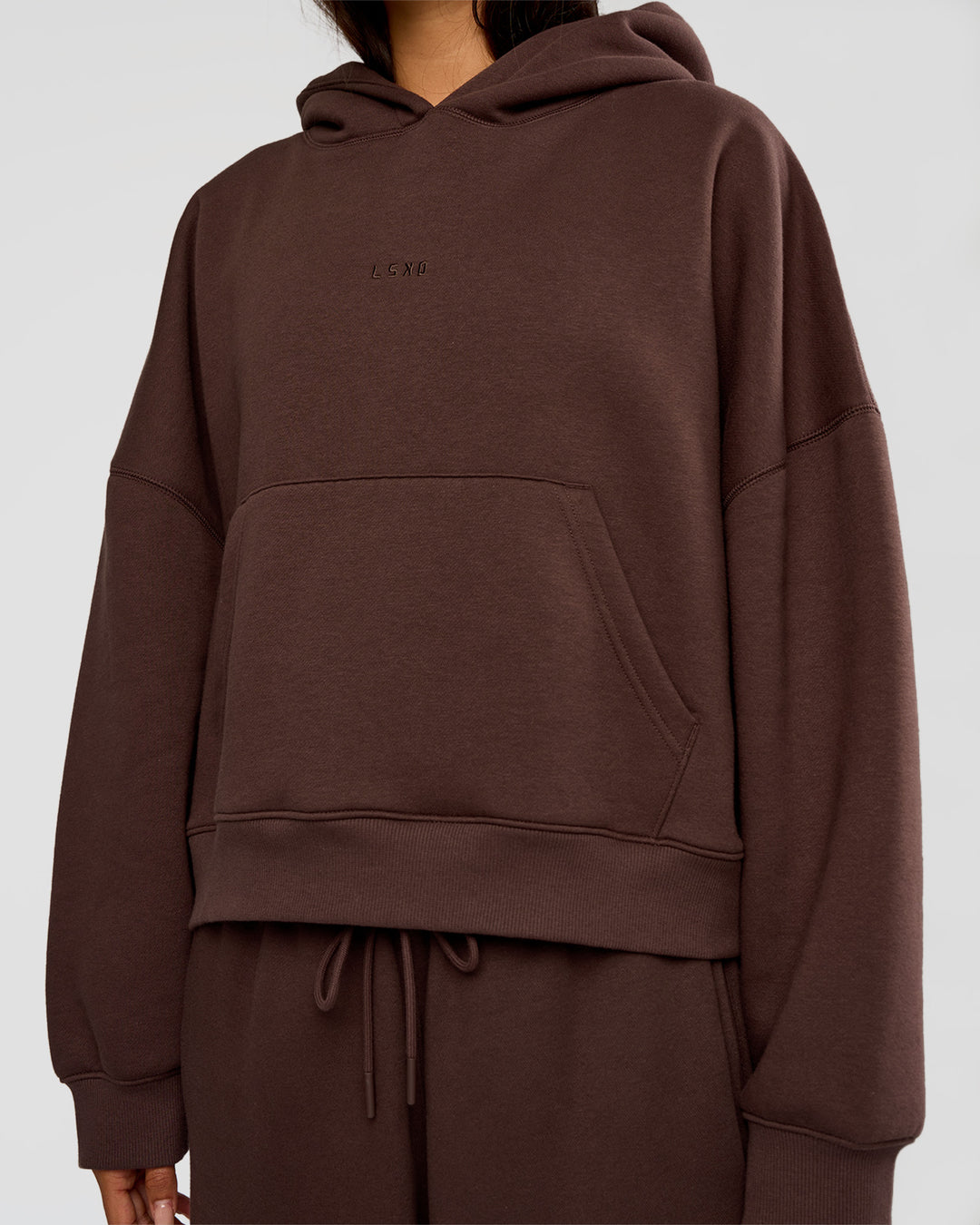 Woman wearing Post Train Hoodie - Hot Chocolate | Model:Ruby | Size:S - view 6