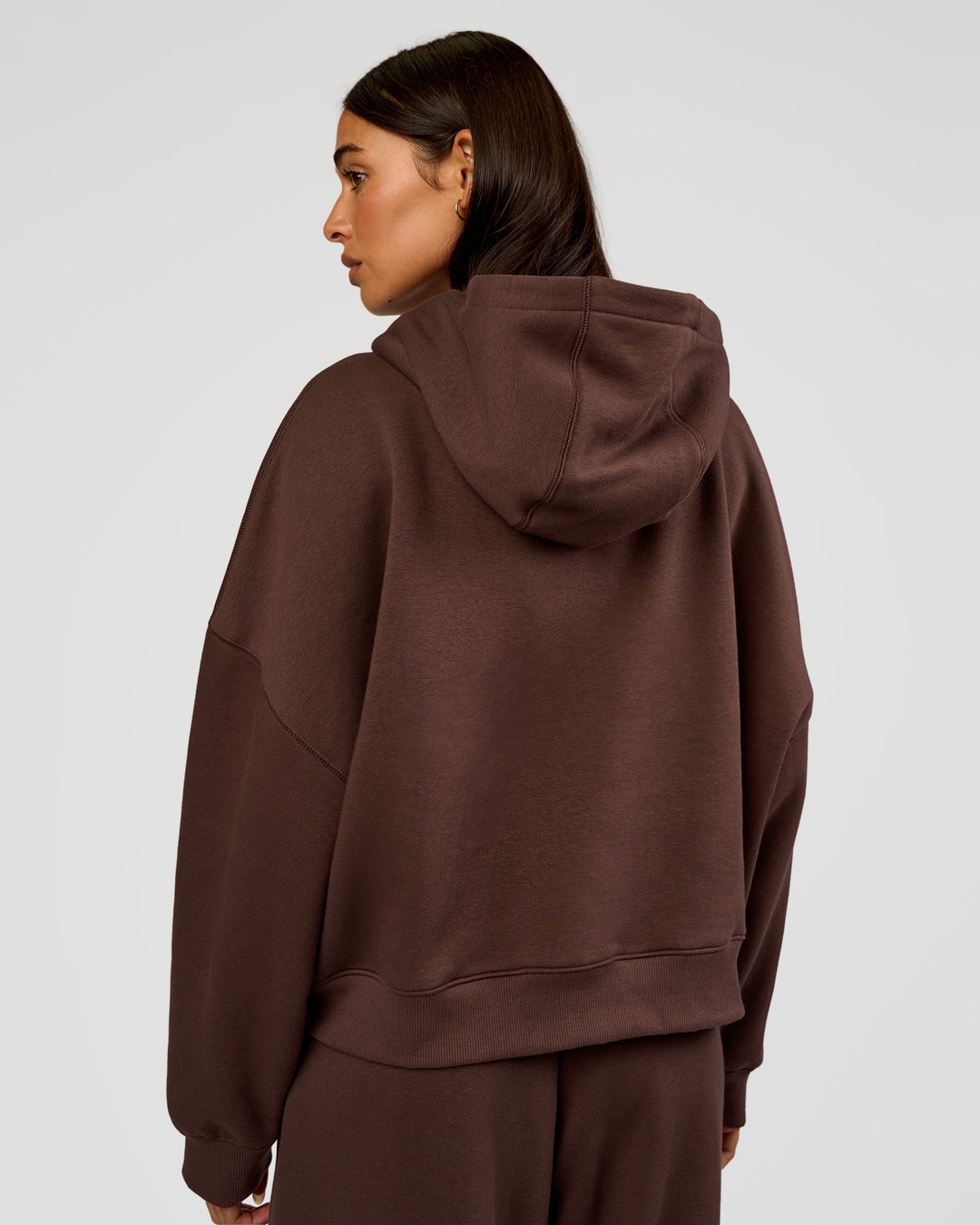 Woman wearing Post Train Hoodie - Hot Chocolate | Model:Ruby | Size:S - view 3