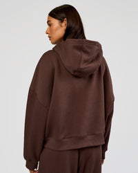 Woman wearing Post Train Hoodie - Hot Chocolate | Model:Ruby | Size:S | Thumbnail Index: 2