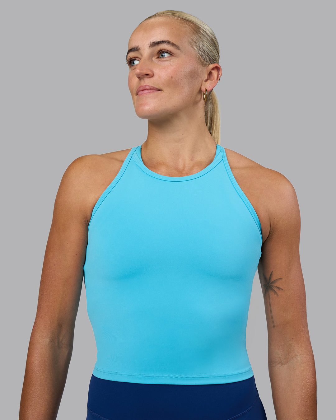 Woman wearing Power Performance Tank - Blue Atoll | Model:Katie | Size:S - view 1