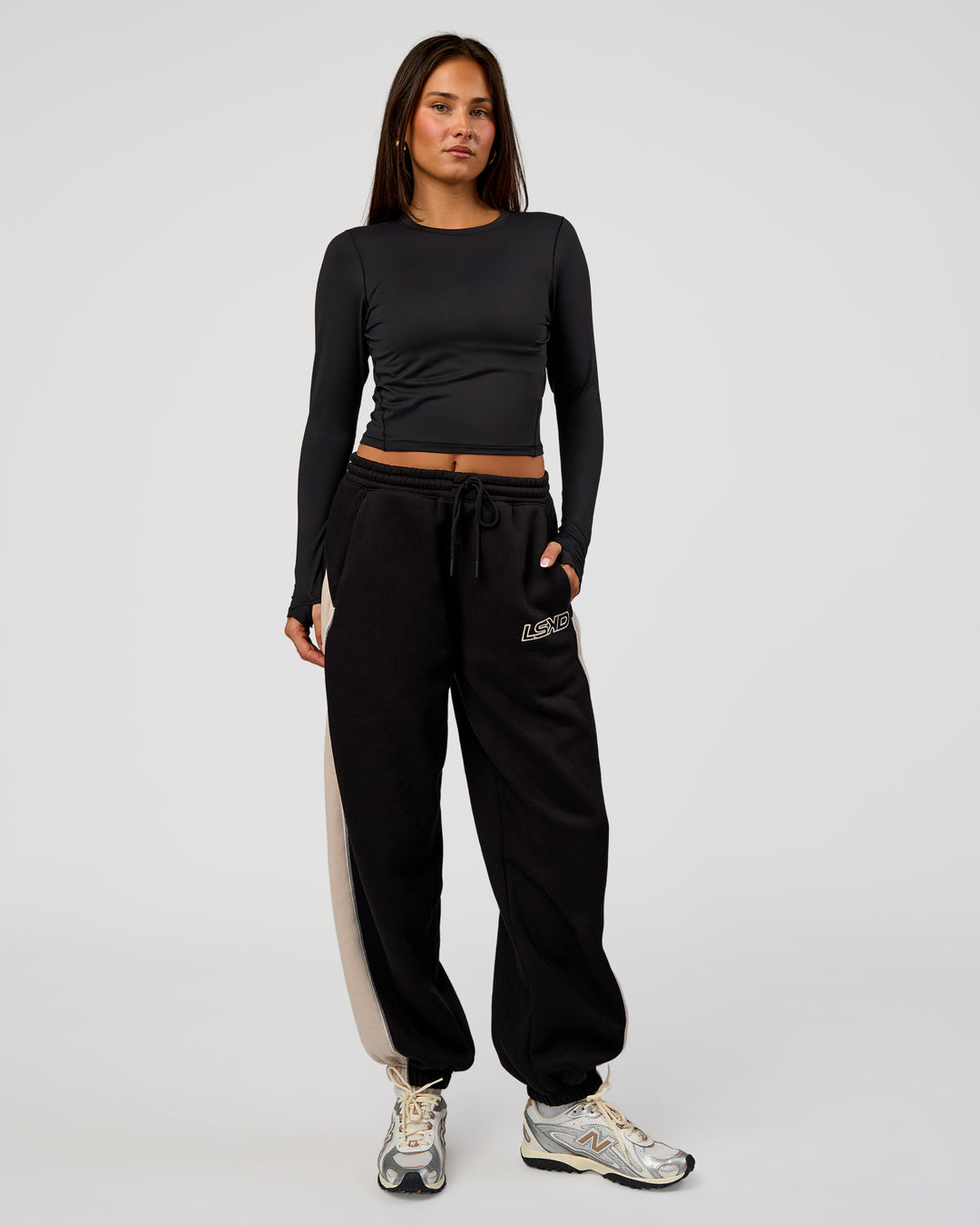 Woman wearing Power Play Stitch Up Fleece Sweat Pant - Black-Shale Beige | Model:Bianca | Size:S - view 9