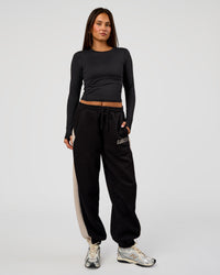 Woman wearing Power Play Stitch Up Fleece Sweat Pant - Black-Shale Beige | Model:Bianca | Size:S | Thumbnail Index: 8