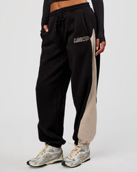 Woman wearing Power Play Stitch Up Fleece Sweat Pant - Black-Shale Beige | Model:Bianca | Size:S | Thumbnail Index: 9